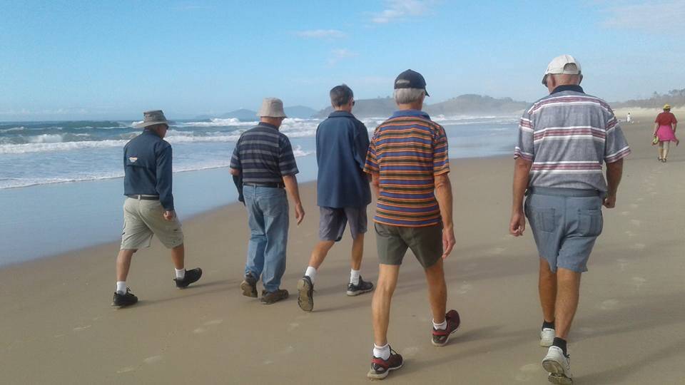 Part of the group walking Grassy Head beach