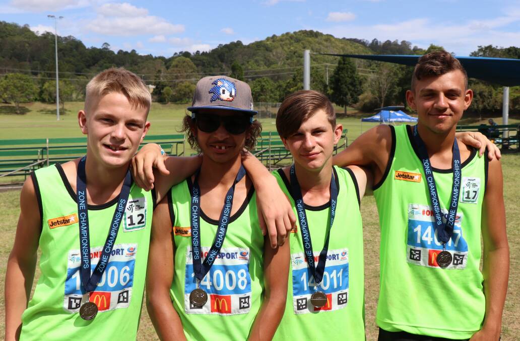 SENIOR BOYS RELAY: Malcolm Noble, Joven Walker, Brady Atkins and Isaac Hodnett-Daly won the silver medal