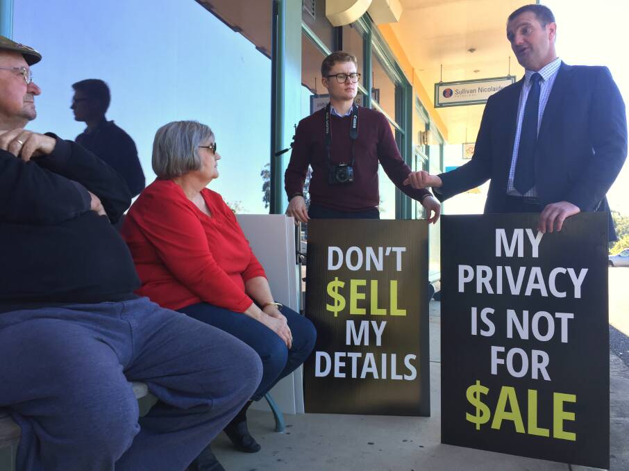 NSW opposition spokesperson Clayton Barr speaks with concerned locals about the failed disallowance motion he moved in parliament in June to stop the tender of Service NSW Contact Centre to private companies.