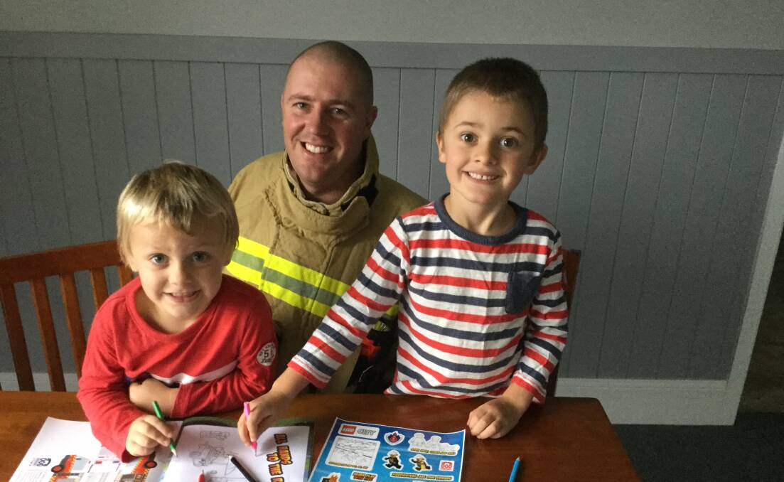 CREATIVE FIRE SAFETY: Harry and Archie Duncan getting busy, along with their dad, Bowraville Station Commander, Max Duncan