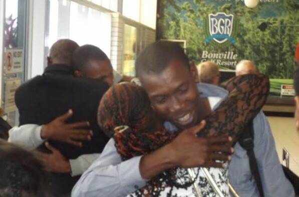 FAMILY REUNITED: After 14 years of being apart, Gasore, a Congolese man, has finally been reunited with his family who have been stuck in a Rwandan Refugee Camp.