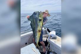 Zayne Cassidy with a fantastic mahi mahi he caught off South West Rocks. Picture supplied
