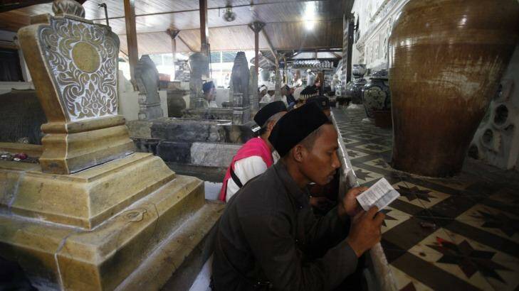 Worshippers pray at the shrines in the hope that the Wali Songo will intercede with God on their behalf. Photo: Irwin Fedriansyah