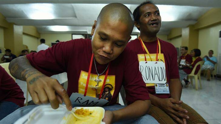 Ramson Donado eats during a break at the San Roque Church rehab program. Photo: Kate Geraghty