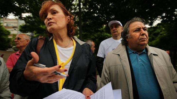 Irem Kutluk (left), the wife of detained Turkish admiral Ali Deniz Kutluk, demands justice for her husband and other officers imprisoned over the "Sledgehammer" plot in Besiktas Square, Istanbul, on May 31. Photo: Kate Geraghty