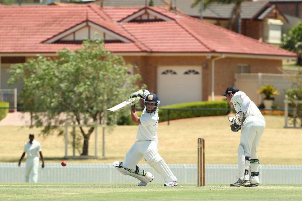 Best of the West: Phillip Hughes on his way to another century for Western Suburbs against Blacktown in 2011. Photo: Anthony Johnson 