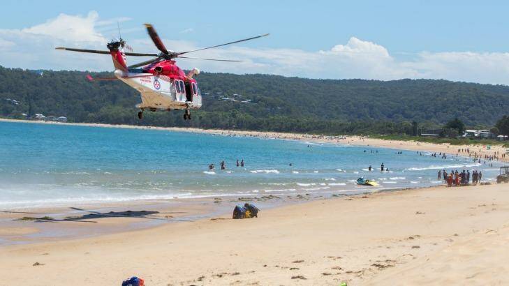 A man has died after being pulled from the water in distress, at Ocean Beach, near Umina on the Central Coast.