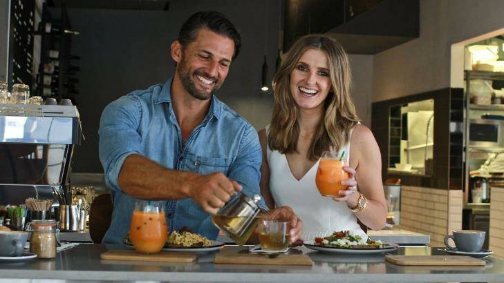 Tim Robards and Kate Waterhouse enjoy lunch at Sticky Fingers Cafe in Surry Hills. Photo: Ben Rushton