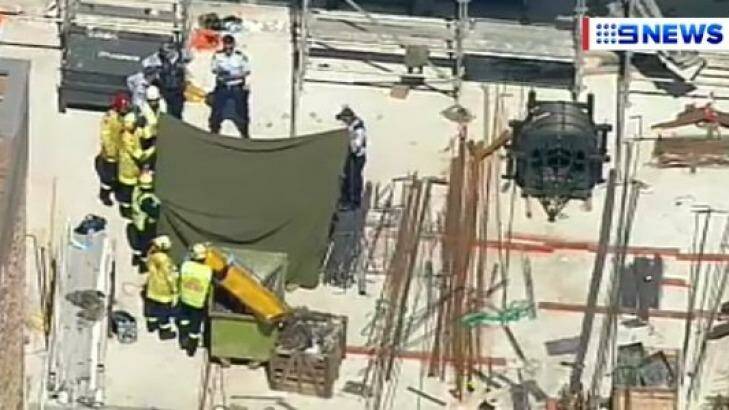 Police and paramedics at the building site in Ryde. Photo: Nine News