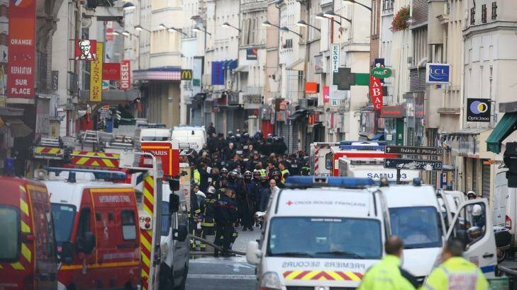 Military and police conduct an operation in St Denis. Photo: Andrew Meares