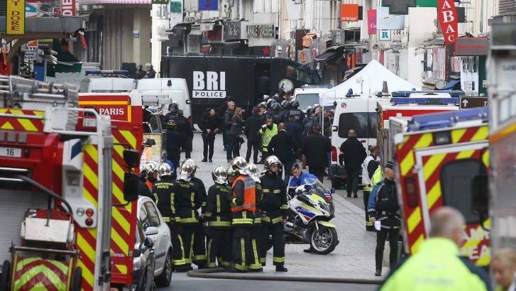 Military and police conduct an operation in Saint Denis on Wednesday. Photo: Andrew Meares