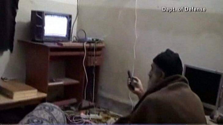 Al-Qaeda leader Osama bin Laden watching television at his compound in Abbottabad, Pakistan. Photo: Department of Defence