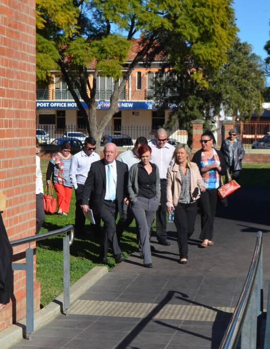 Hilton Humphries and his supporters leaving Moree Courthouse yesterday afternoon. PHOTO: Laini Kirkman