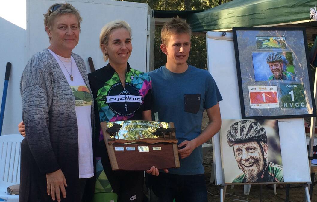 The Brian Cockbain Memorial Trophy was presented to the champions Anna Beck and Ethan Kelly by Donna Cockbain