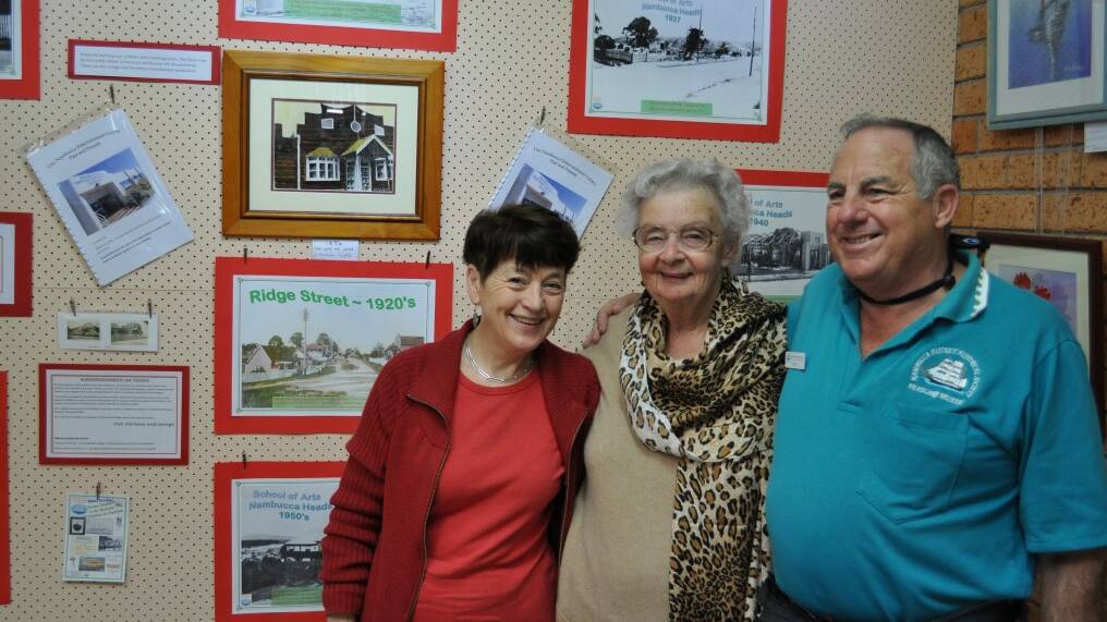SNAP TO IT: Marlene Griffin, Pat Richardson and George Micolich at the opening of a photographic exhibition tracing
the history of what is now the Nambucca Entertainment Centre