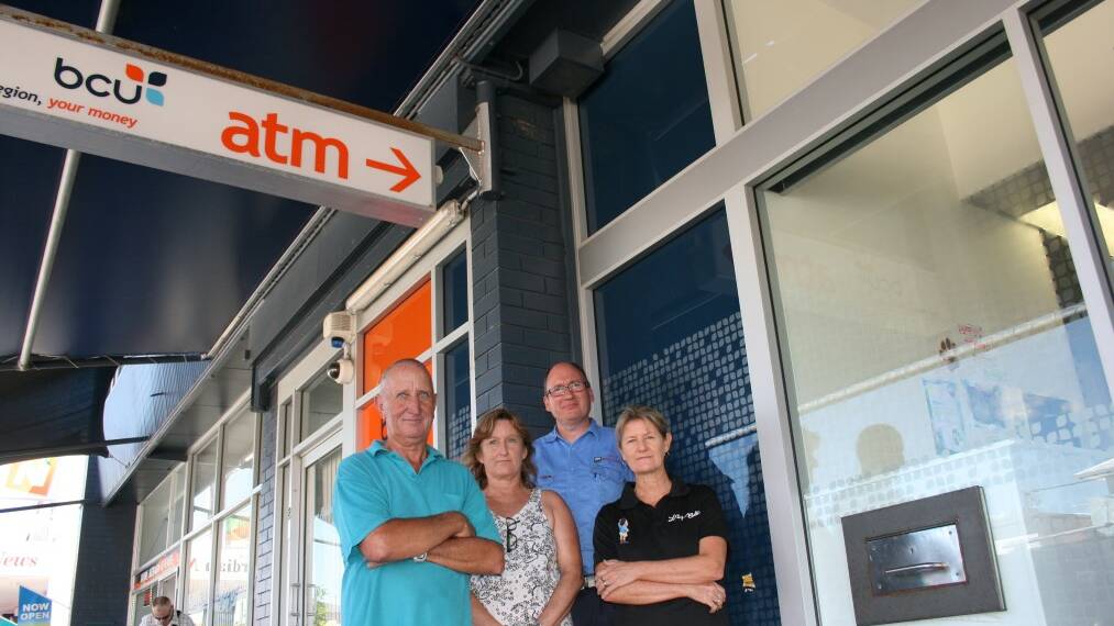 FUMING: Business owners outside bcu Nambucca Heads, which was closed over the Christmas/New Year break. From left, Tony Stokes, Jenny Ellis, Michael Beattie and Annie De Groot