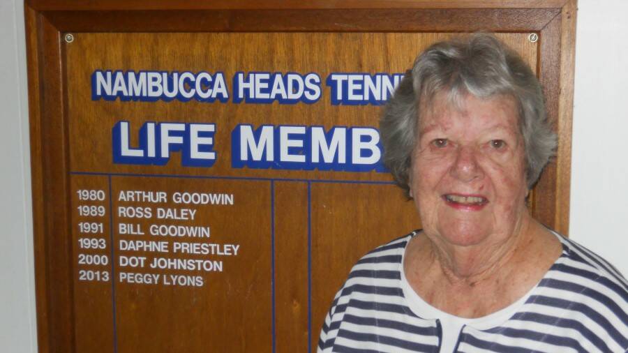 SET FOR LIFE: Peggy Lyons in front of the tennis club’s honour board