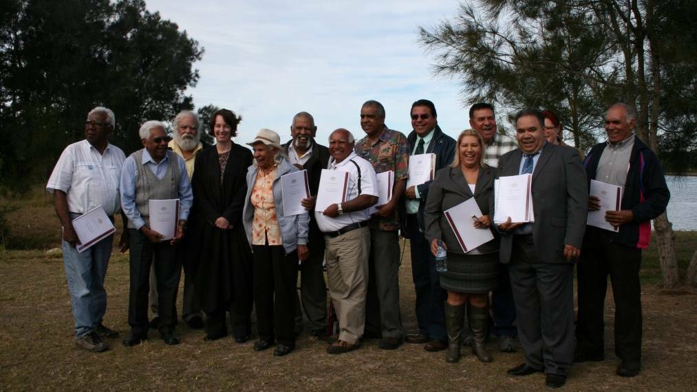 LOOKING BACK TO AUGUST 18, 2014: Justice Jayne Jagot, fourth from left, with the successful Gumbaynggirr claimants. Aunty Jessie Williams, fifth from left, is the only living member of those who originally made the claim in 1996.