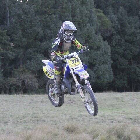 RIDING OF THE BULLS: Finn Laverty hitting the jumps at the family property