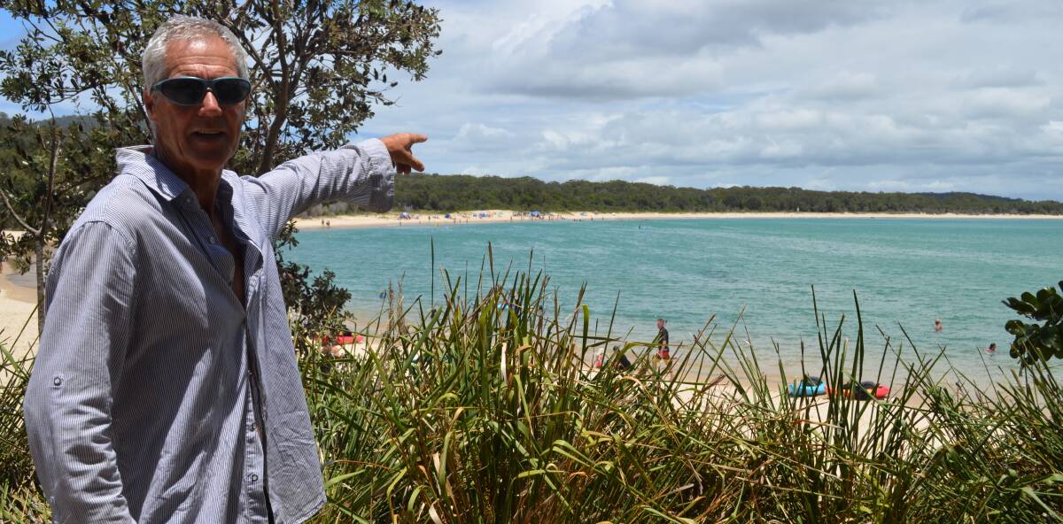 Encounter: Terry Wells points out the spot at Trial Bay beach where he was circled by a three-metre hammerhead shark. Photo: Callum McGregor.