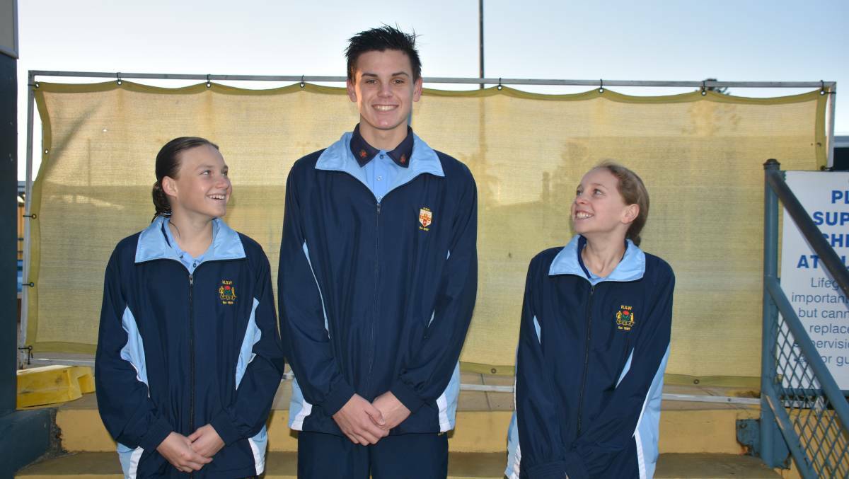 Macksville's national schools swimming title representatives Leah Pickvance, Declan Sutton and Millie Edwards. Photo: Christian Knight