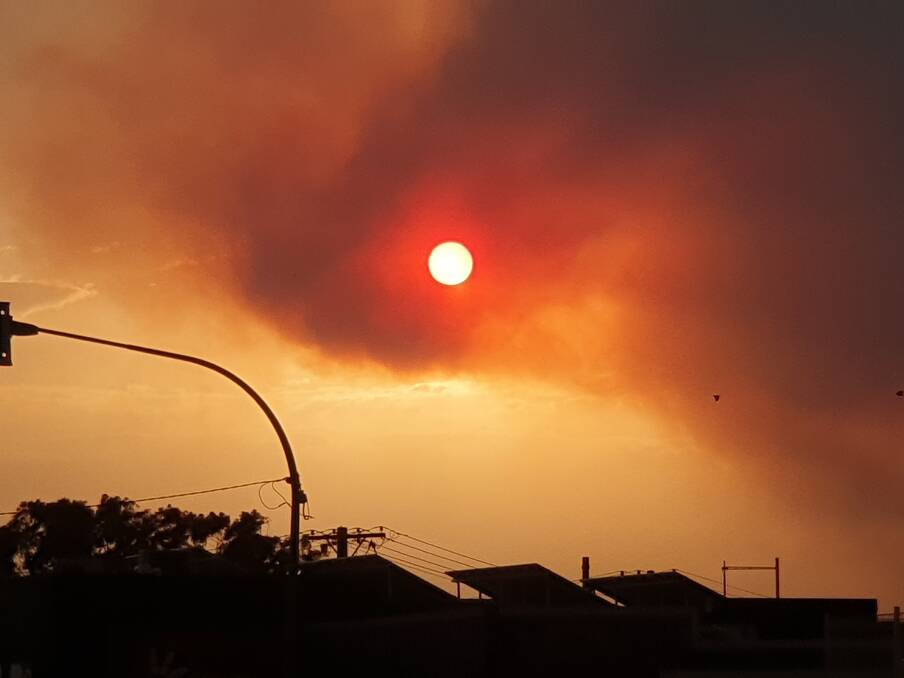 This dramatic photo was taken by Sue Hughes from the steps of the Nambucca Heads Library at 5pm on Friday