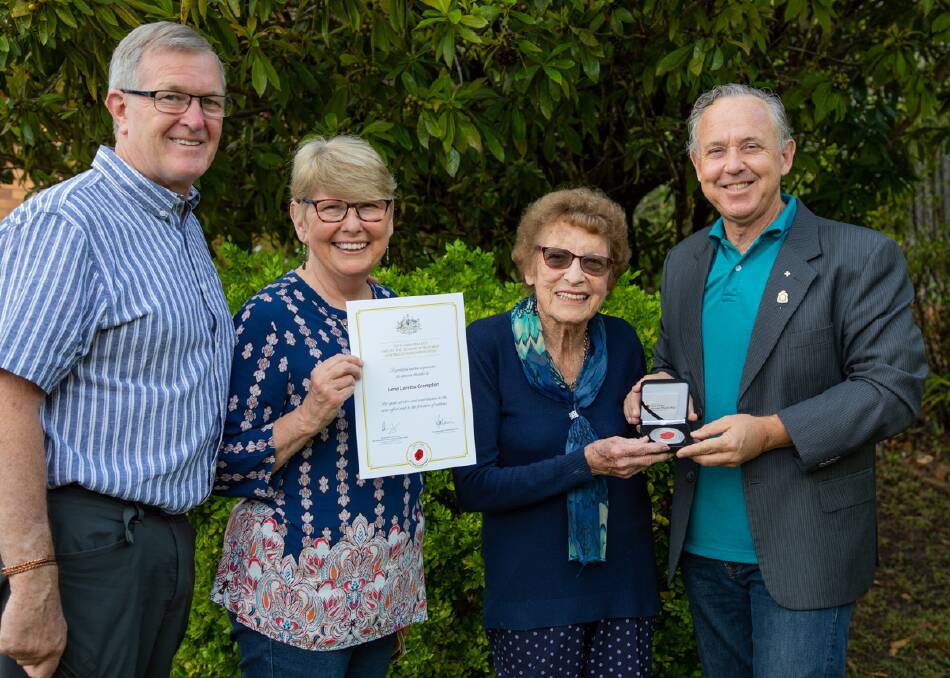 Lena Crompton is congratulated on receiving the End of WWII Commemorative Medallion and certificate by (from left) her son-in-law Max Wallace, her daughter Lynne Wallace and Mick Birtles from the Nambucca Heads RSL Sub Branch. Photo Tina Birtles