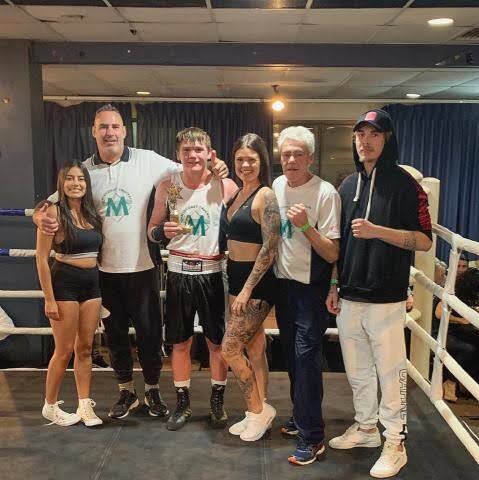 Peter Conroy (third from left) celebrates his win on Saturday night