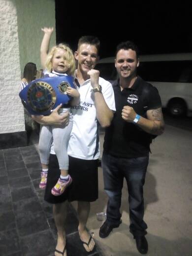 Mitchell Whitelaw with daughter Kendal and leading Australian fighter Daniel Geale