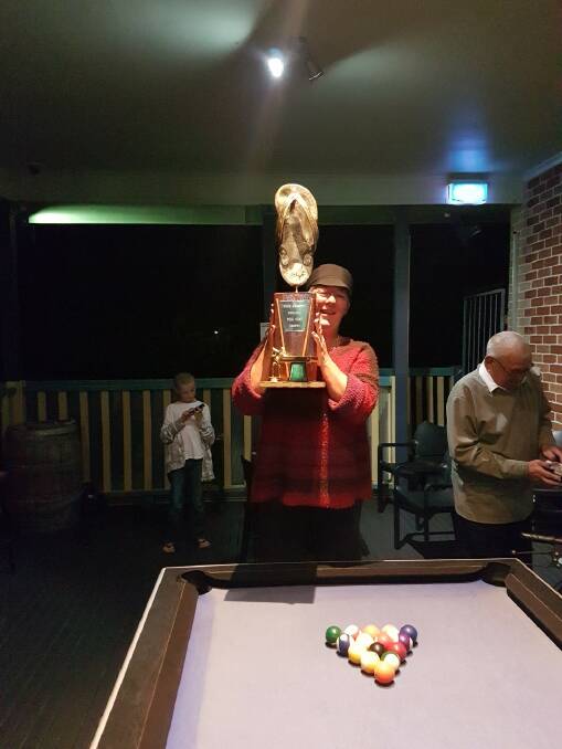 Nat Burke with the trophy for the Dave Marriott Memorial Pool Competition