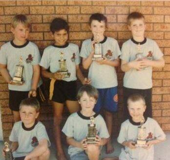 A young Greg Inglis (second from left, back row)