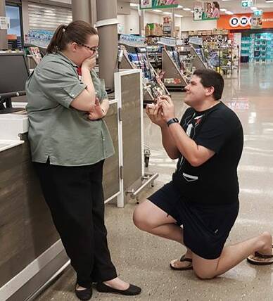 WHAT THE: Shoppers did a double take at Katherine's Woolworths' store on Wednesday night when Katy Jay's beau Chris Gill popped the question. Picture: supplied.