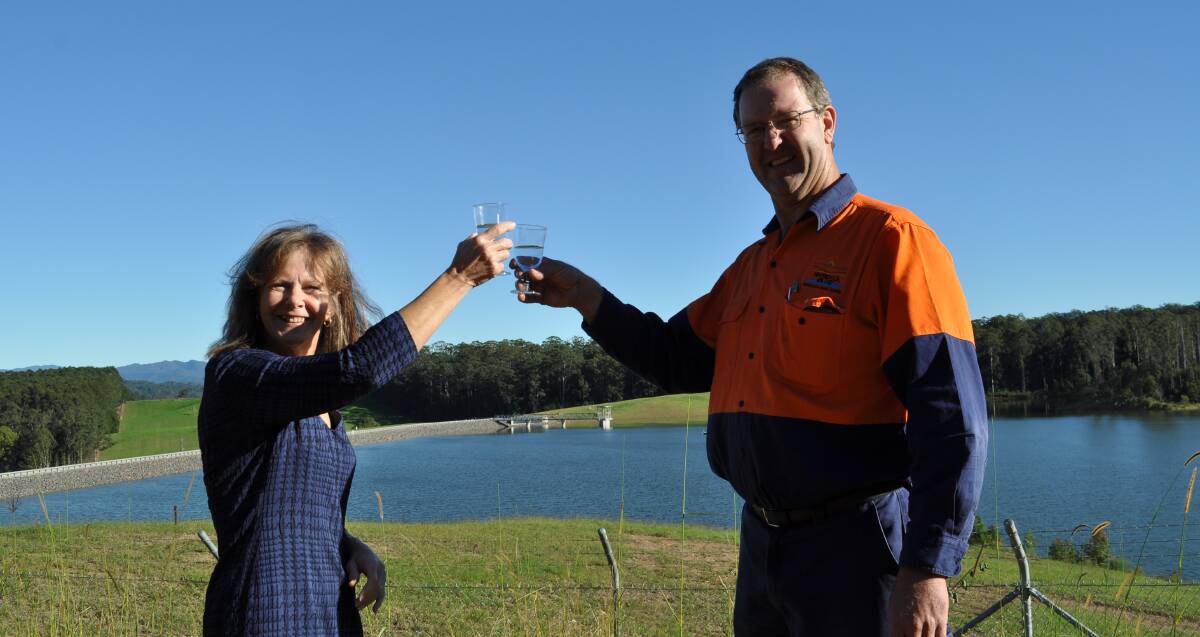 DAM GOOD: Mayor Rhonda Hoban and water operator Ken Welsh toasting the milestone with a glass of crystal clear water