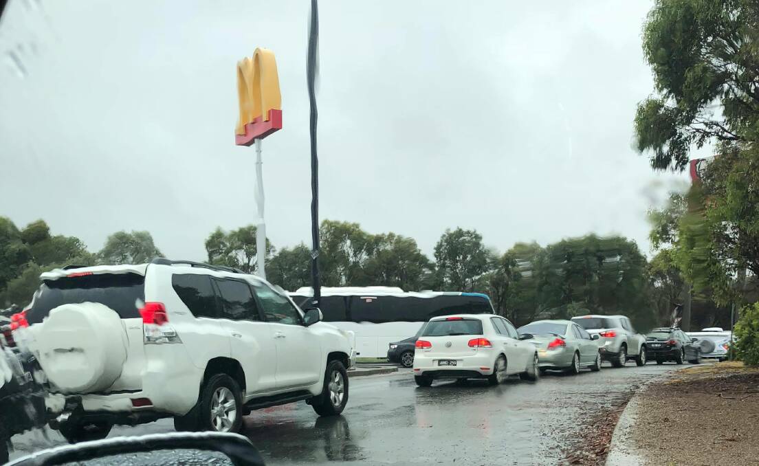 Reports of a 15-minute wait to exit the Yass service centre as heavy rain batters the region. Picture: Supplied