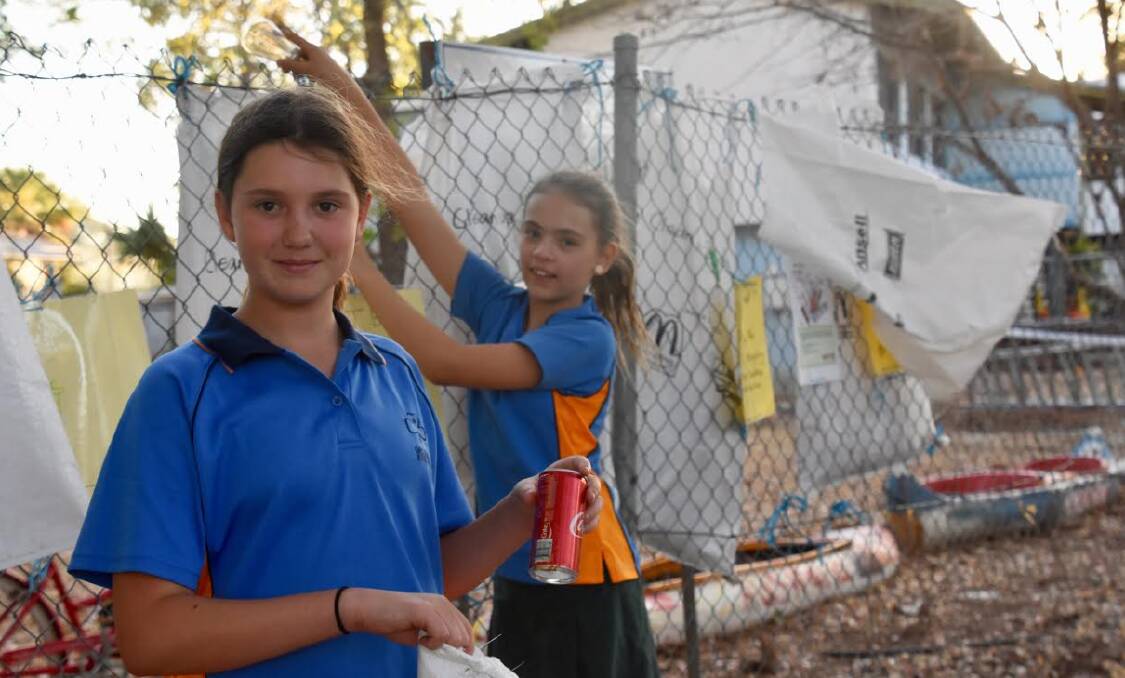 Young stars: Katherine Girl Guides Kylie Lambert and Evie Arnott have taken the town's lack of recycling options into their own hands.