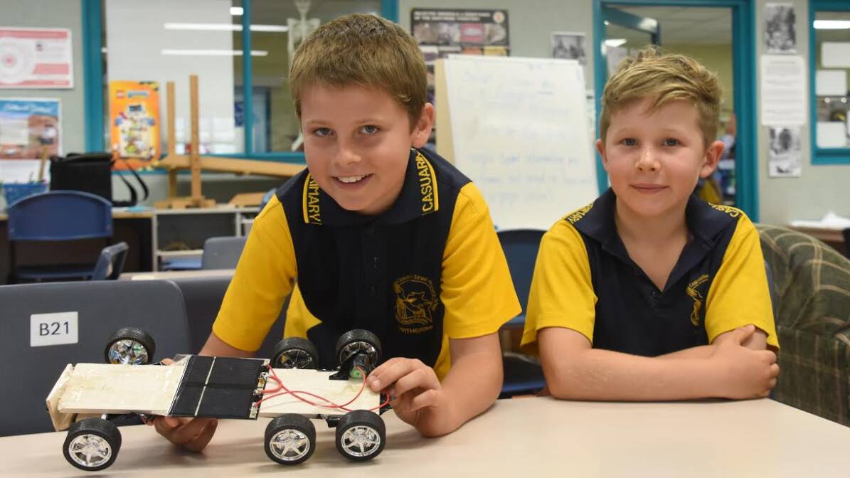 Quick learners: Year four students at Casuarina Street Primary School in Katherine NT, Lachlan De Beer and Jack Curtain are building their own solar-powered cars as a school project. 