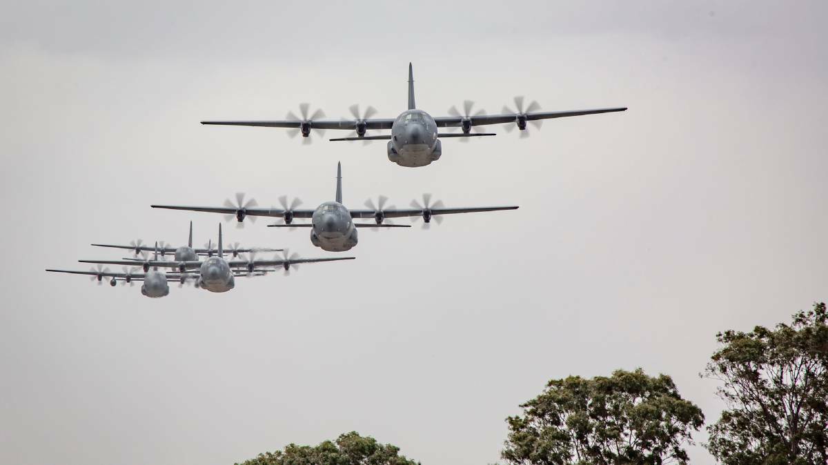 C-130J Hercules aircraft from No.37 Squadron fly in formation over RAAF Base Richmond. Picture: Department of Defence