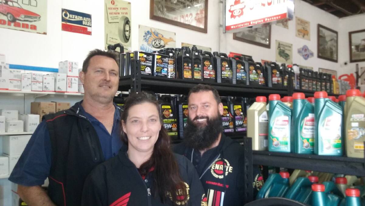 IN HIGH GEAR: Automotive Spare Parts staff from left, Mark Rothe, Alysia Brennan and Pete Simpson. Owner Jeneane Donohoe steers her business to success.