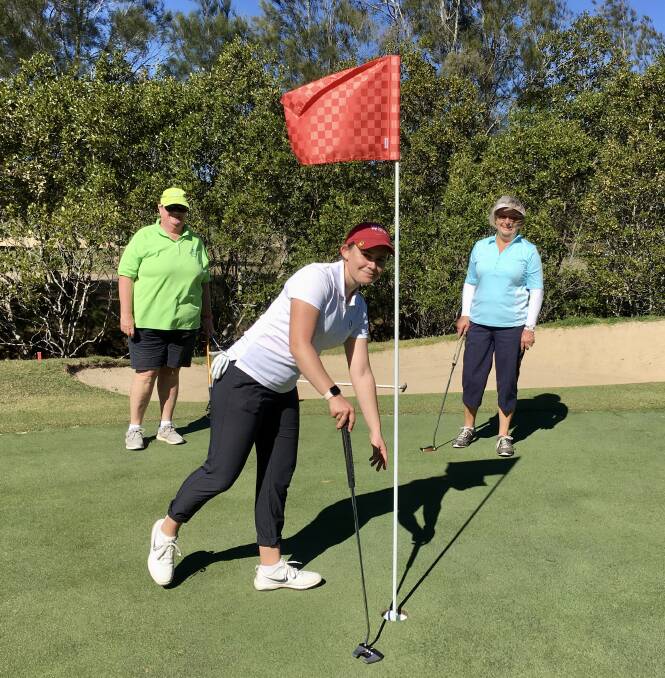 Darcy Habgoods last putt of the day with partners Henny Oldenhove and Sue Brooks.
