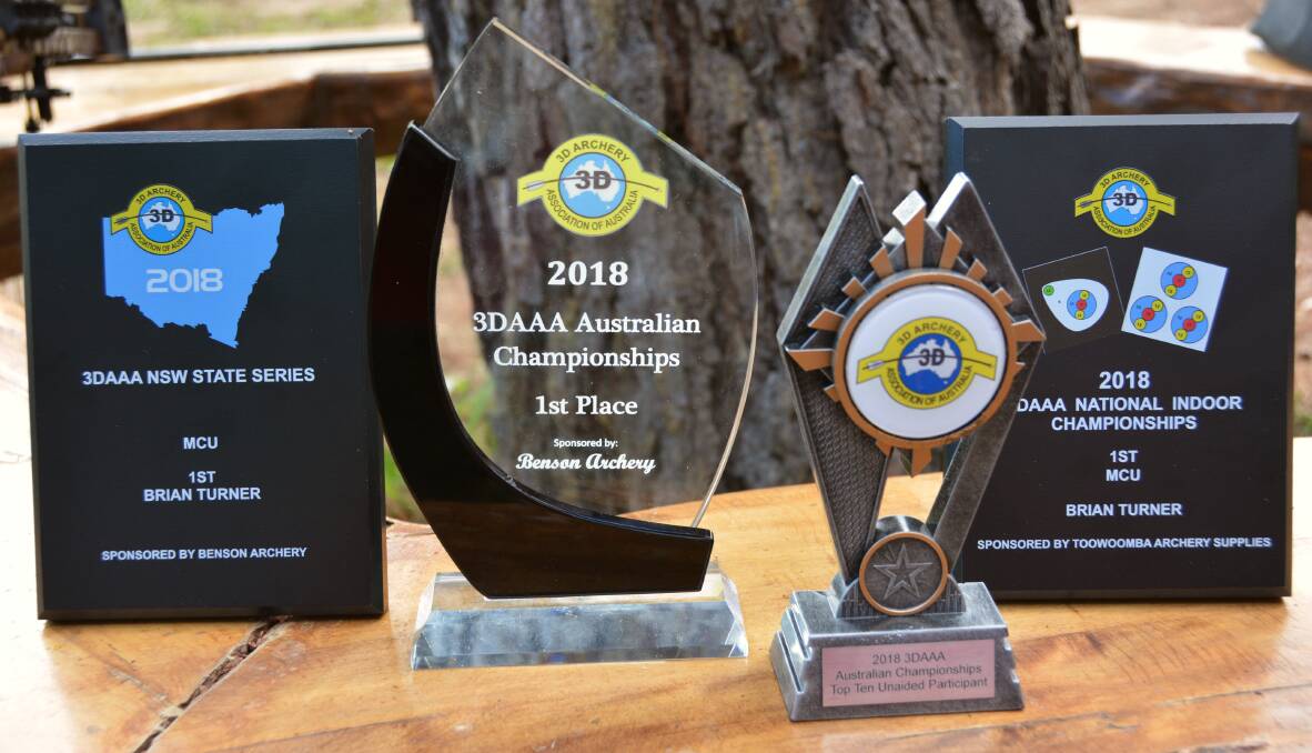 Brian's swag of awards with the glass Australian Championships trophy he won a fortnight ago in Nambucca.