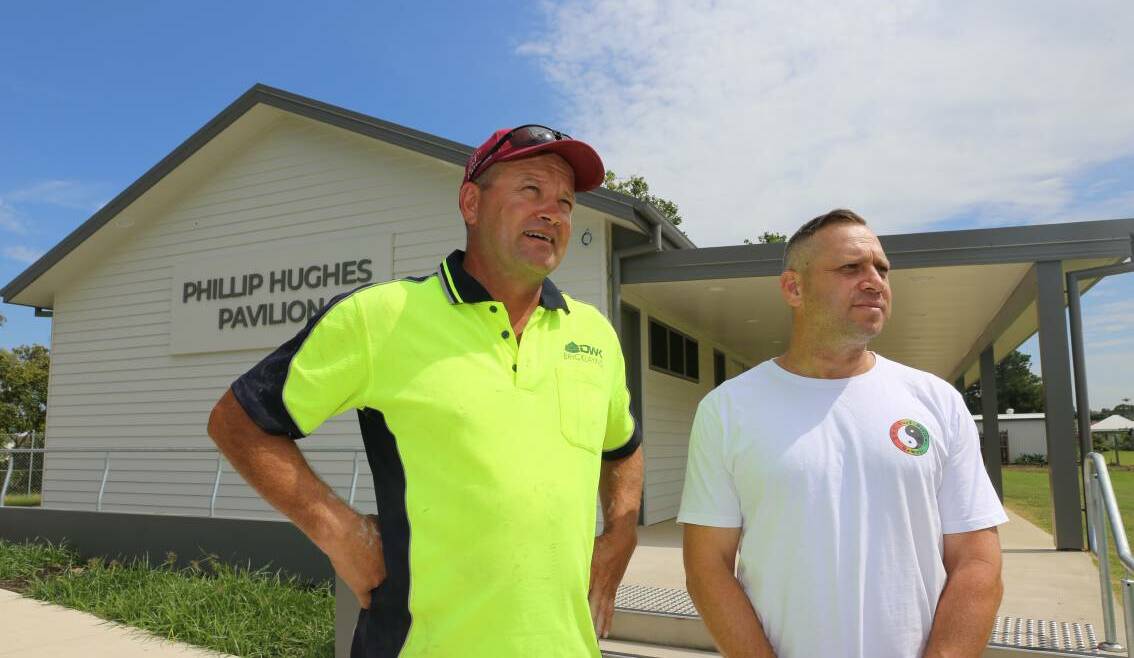 Michael Stennett and Nino Ramunno in front of Macksville's premier cricket venue. The Nambucca Valley cricket teams will be sharing the Phillip Hughes Oval with the Premier League this season.