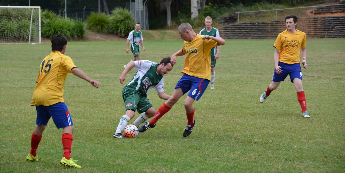Flashback to Challenge Cup 2016: Lawson Timouth (yellow shirt) for Nambucca tackles a Sawtell player. Photo: Christian Knight