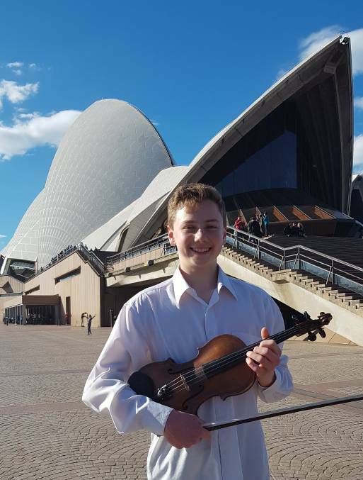 Violin virtuoso: Jonah Spriggs played at the Sydney Opera House alongside the Australian World Orchestra and elite players from the Australian Youth Orchestra.