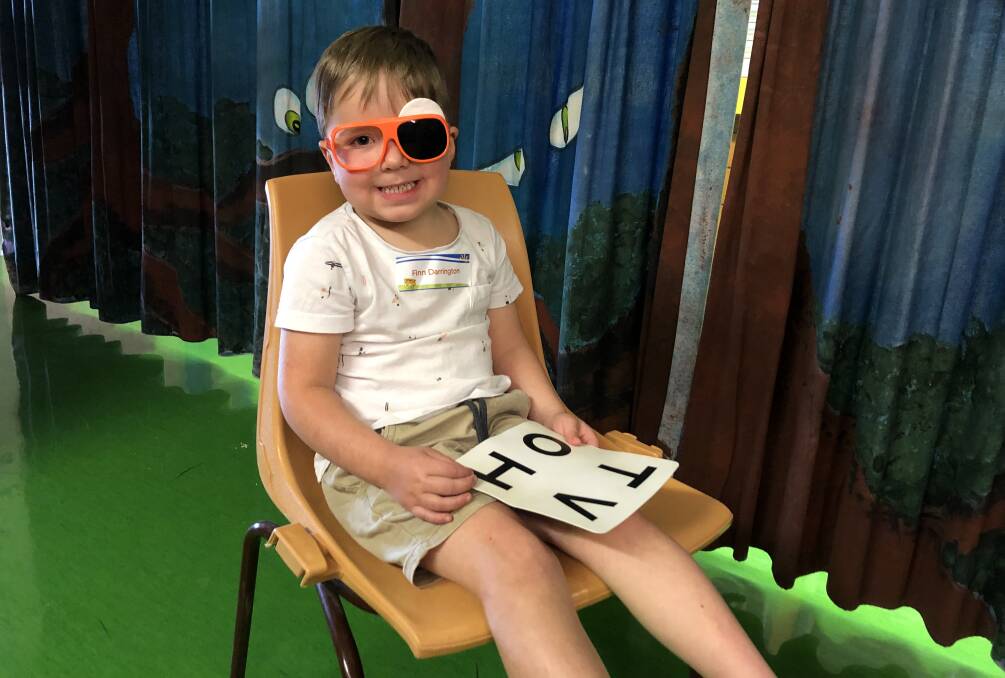 Finn getting his eyes tested with StEPS Vision Screening