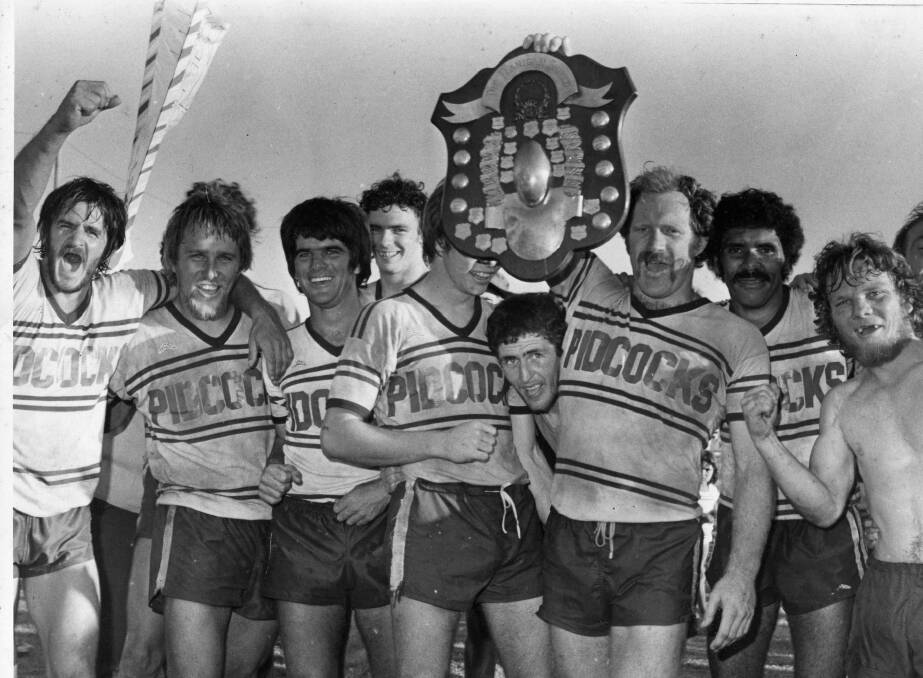 Macksville's 1979 first grade premiers with their spoils