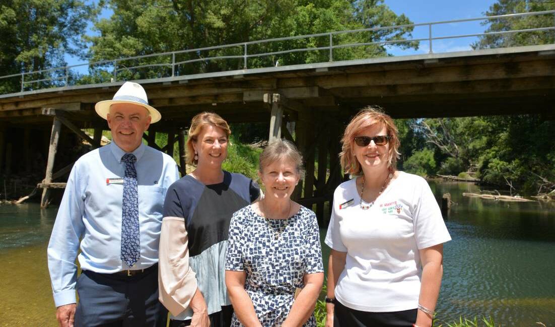 Council general manager Michael Coulter, Roads Minister Melinda Pavey, mayor Rhonda Hoban and grants officer Teresa Boorer sign off on the State's $500,000 contribution to the Lanes Bridge replacement.