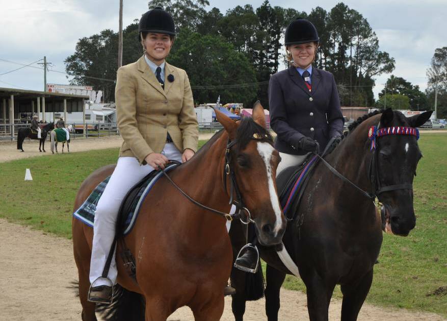 Sara Lucas riding the stock horse Blaze, and Chloe Dwyer riding the thoroughbred horse Confidential
