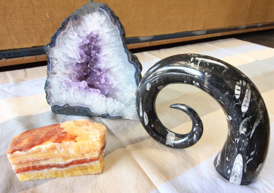 A beautiful amethyst cave, an othoceras horn and banded calcite are just three of the 150 specimens at this year's auction