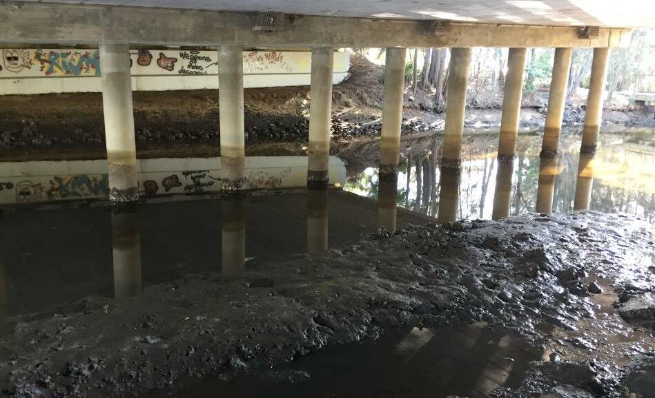 The Bellwood Creek overpass at Giianagay Way where a 'significant' amount of raw sewage overflowed, leaking into into the Nambucca River.