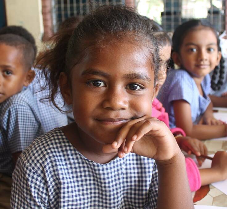 A student from a rural Fijian school which received a donation of stationery and hygiene products. Photo: Molly Langley